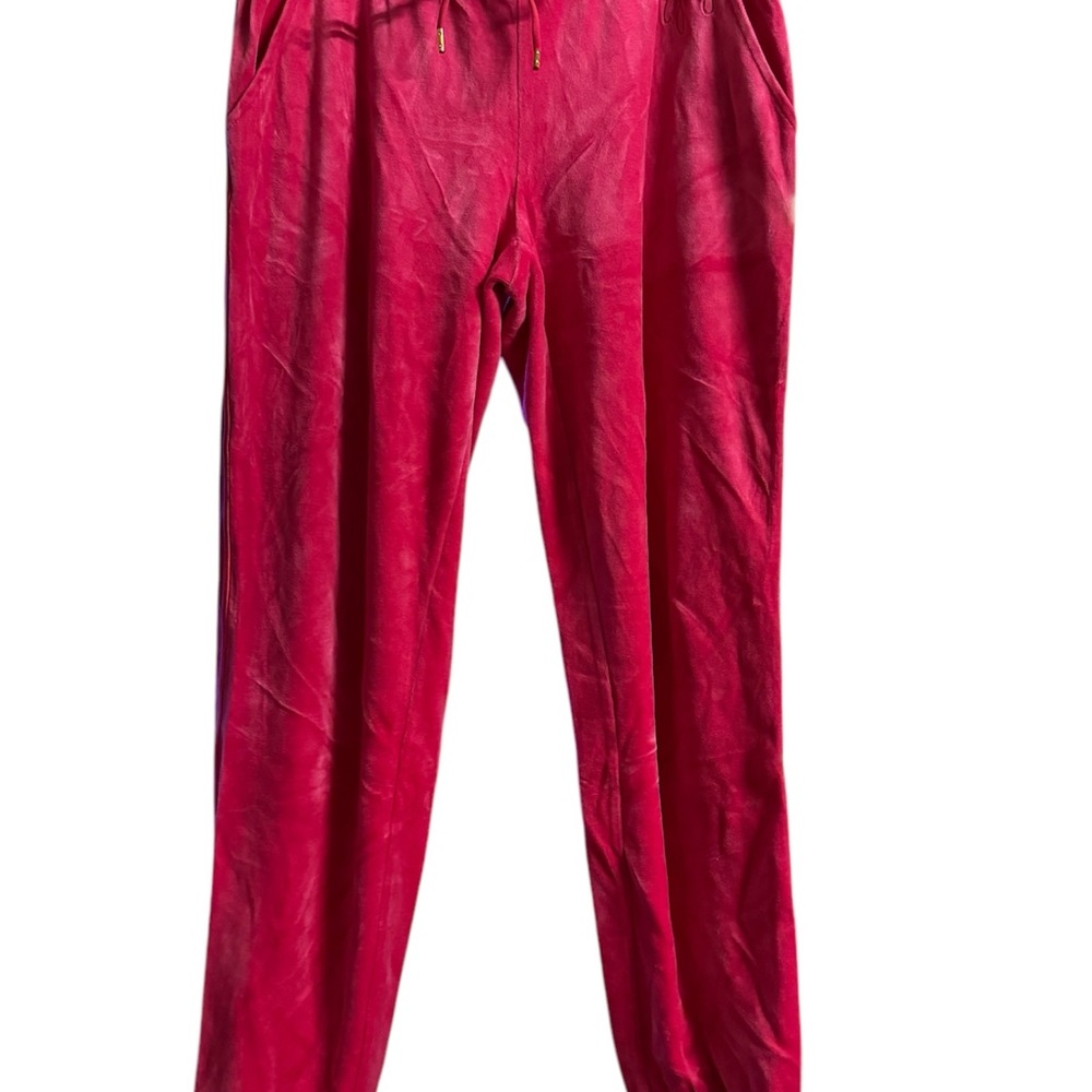 Juicy Couture pink Pants and hoodie set no tags
Pant size M
Hoodie size L
